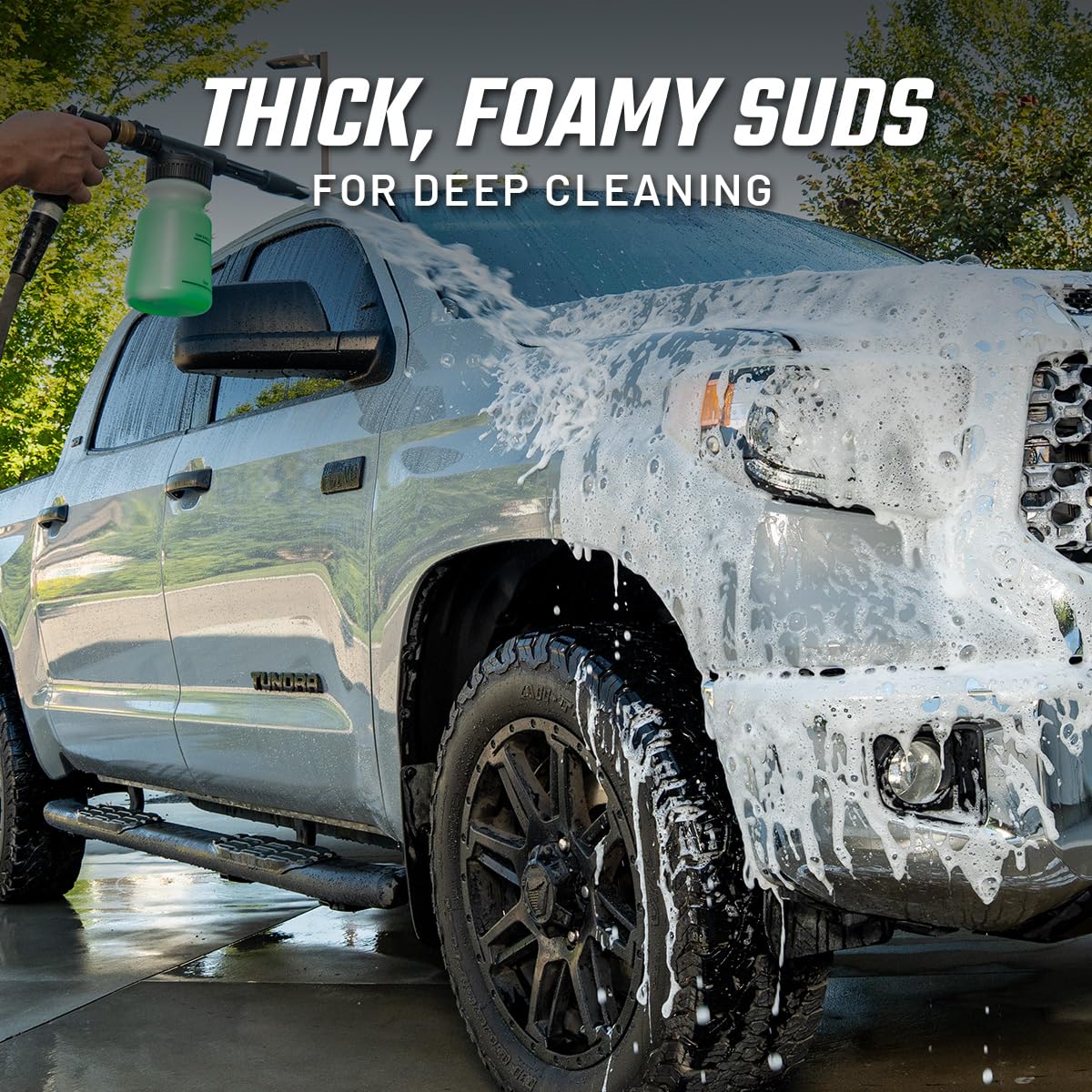 Slick Products thick foam on dirt bike loosens mud for faster, gentler cleaning