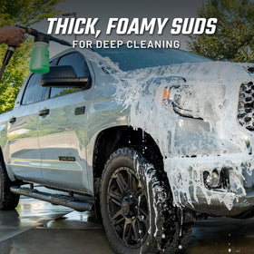 Slick Products thick foam on dirt bike loosens mud for faster, gentler cleaning