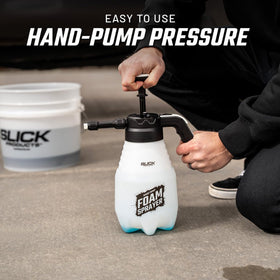 Slick Products sprayer used on an ATV on trail showing portability and off‑road cleaning convenience