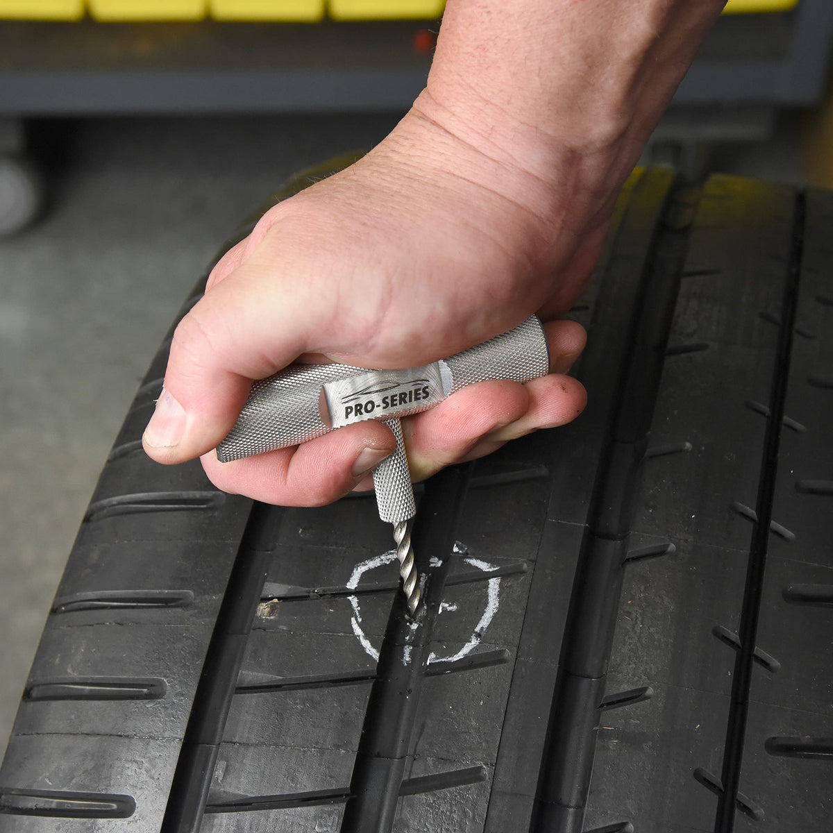 Slime kit being used on an off-road tubeless tire showing fast roadside repair benefit