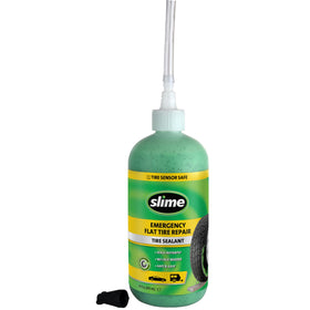 Slime repair in use at roadside showing sealant and inflator restoring tire pressure