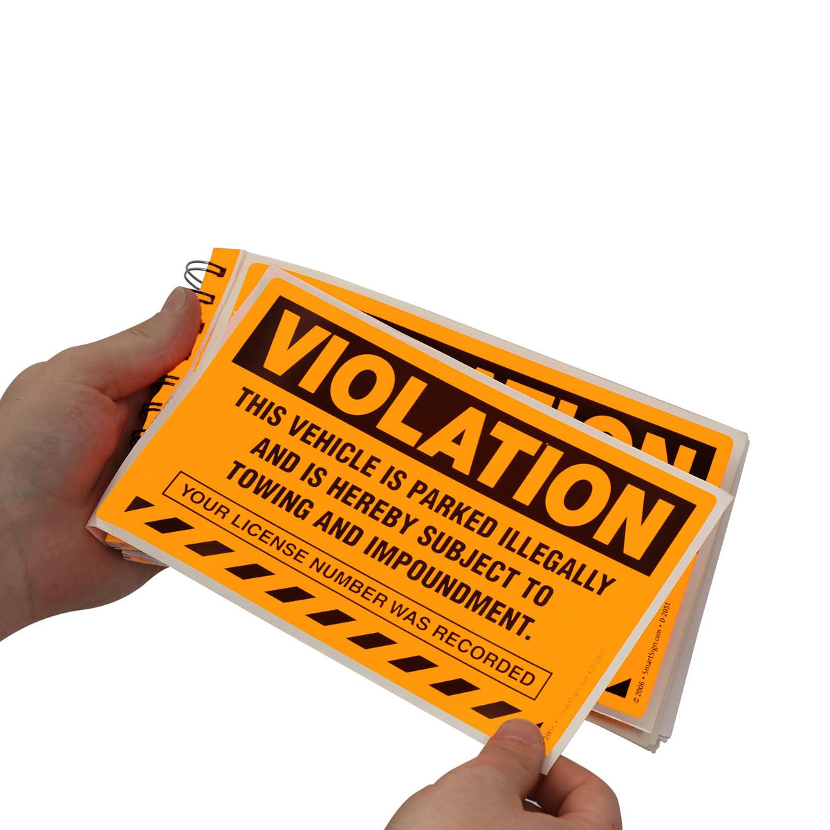SmartSign in parking lot being placed on vehicle showing efficient enforcement