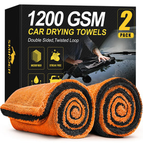 SMINDER front packaging showing two orange towels and size benefit