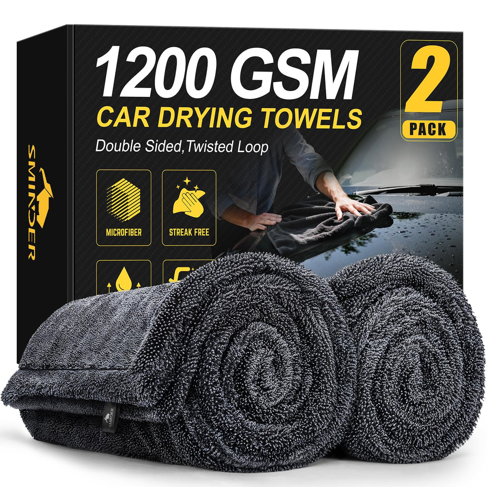 SMINDER front view of two towels in packaging showing size and value