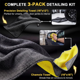 SMINDER hand holding folded towel to show XXL size and coverage