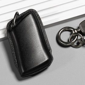 Smyfob key next to credit card showing slim profile and scale advantage