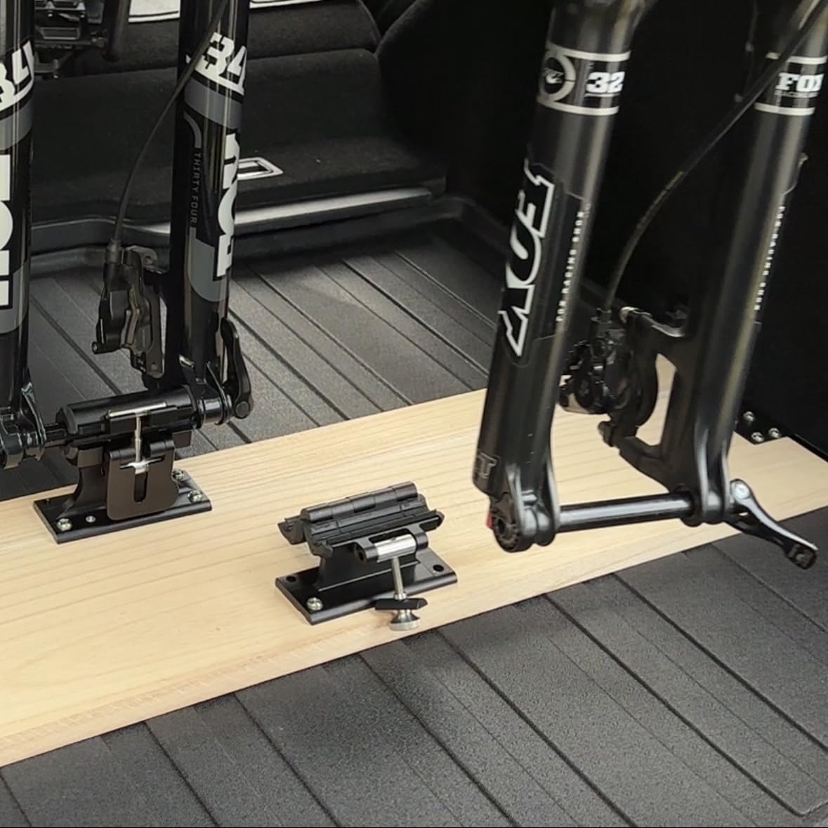 Snap Fork in use while loading a bike into a van showing faster, ergonomic mounting