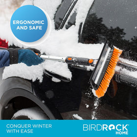 Snow MOOver clearing heavy snow from an SUV roof for safer driving visibility