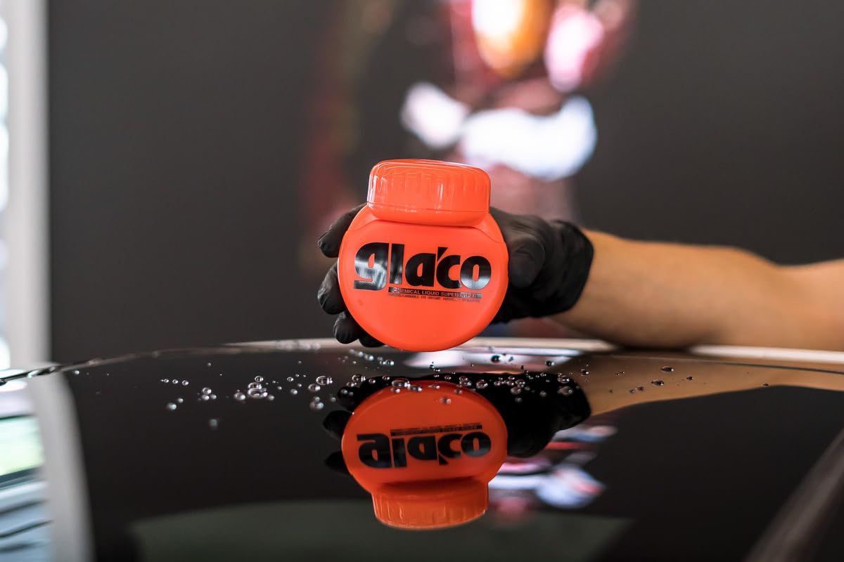 SOFT99 120 ml bottle beside a hand to show scale and convenient size