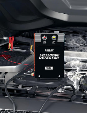 Solary smoke machine in garage setting demonstrating real-world diagnostic use