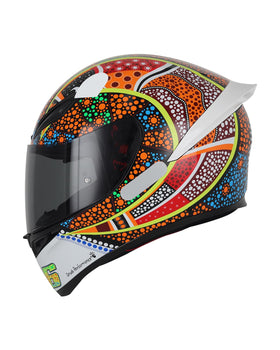 Soman visor on helmet in road setting showing reduced glare benefit