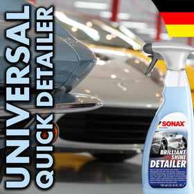 Shiny car treated with SONAX in a showroom-like setting showcasing deep gloss