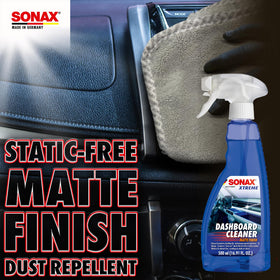 SONAX being sprayed onto cloth then wiped on console demonstrating easy application
