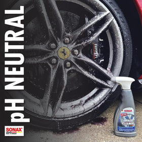 SONAX Full Effect 5L next to a wheel for size comparison and professional value