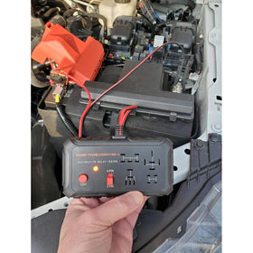 Sound Troubleshooting held in hand for scale, compact portable design benefit