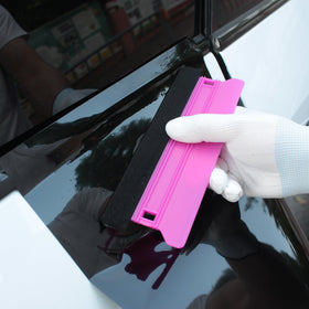 Spanno magnet holder in use securing vinyl for single-person alignment