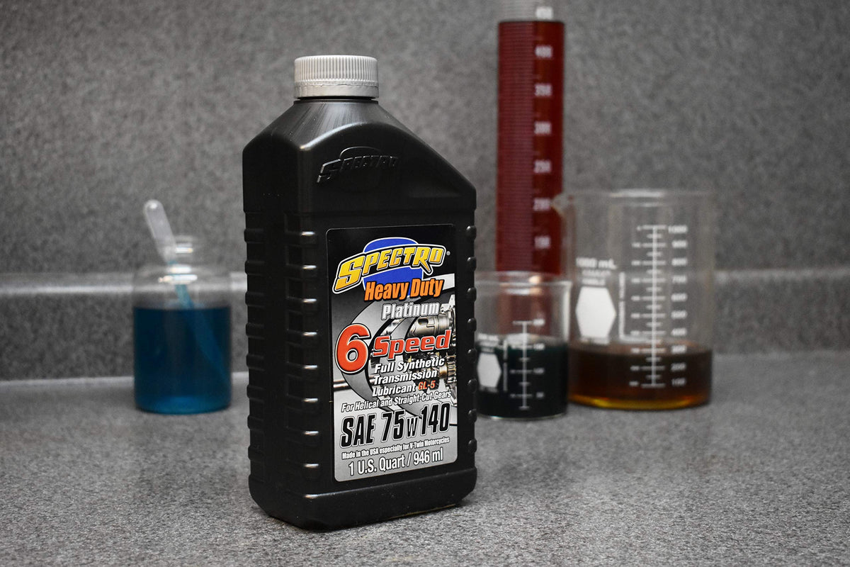 Pouring Spectro R.HDPG6 into transmission showing easy application and quieter shifts