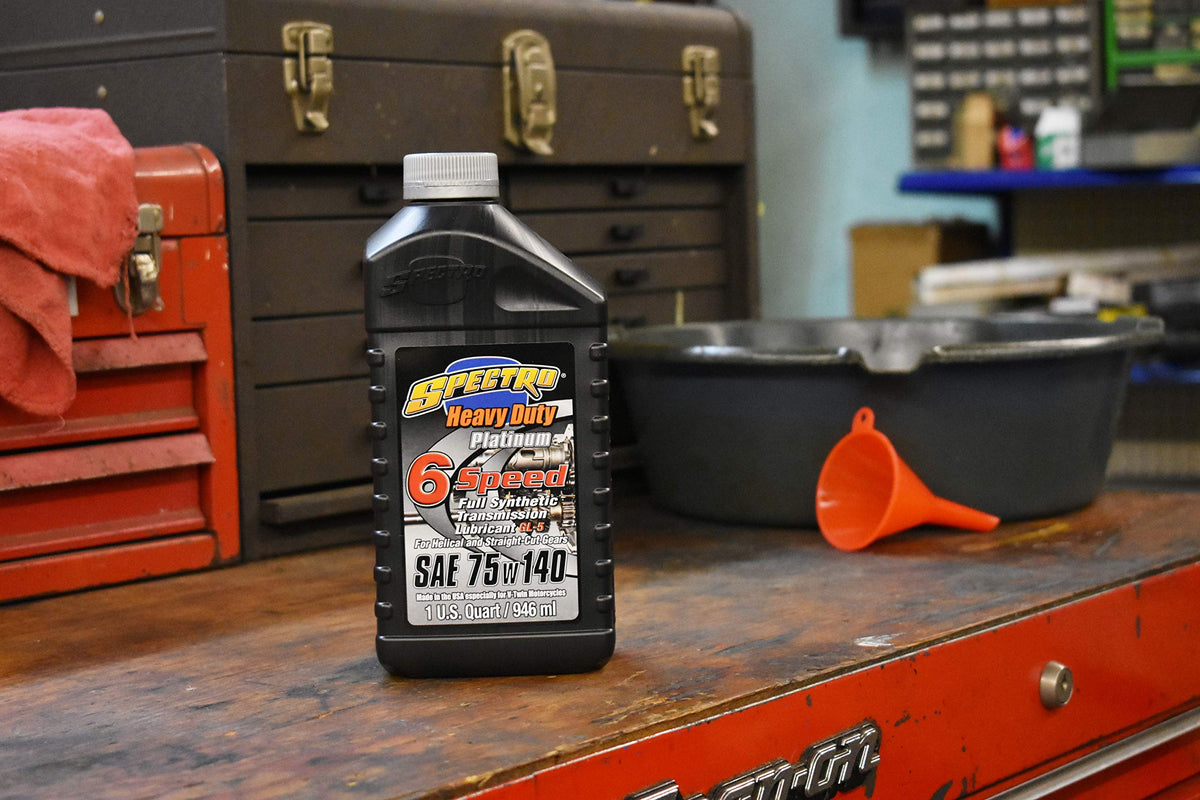 Spectro R.HDPG6 quart next to a wrench showing quart size and service-ready convenience