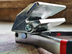 SPEED FORCE next to ruler showing compact size and professional portability