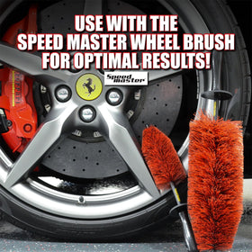 Speed Master in a detailing bay beside wheel cleaner, ready for precision cleaning