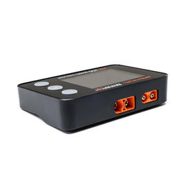 Spektrum XBC200 next to LiPo pack to show scale and battery testing capability