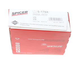 Spicer kit components laid out showing included caps and snap rings
