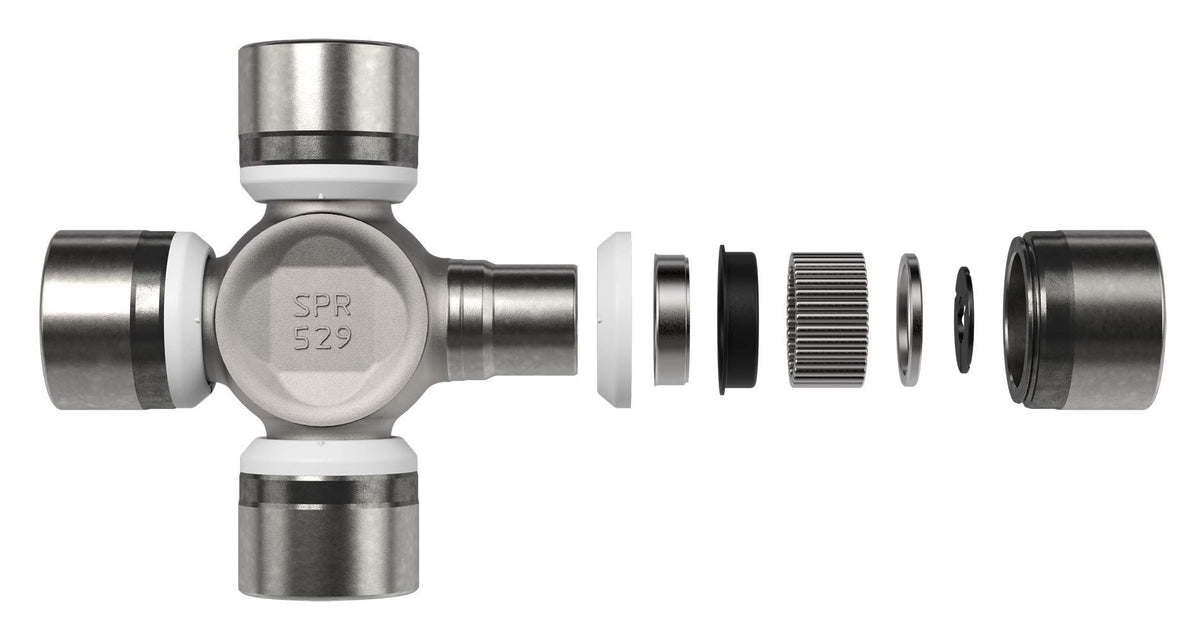 Spicer U-joint with installation tools demonstrating straightforward replacement process