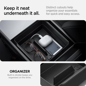 Spigen armrest organizer installed in Tesla Model Y Juniper showing neat in-car use