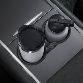 Spigen insert used in a driving scene showing organized console and reduced spills