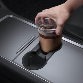 Spigen insert next to a Trenta cup illustrating large-size compatibility