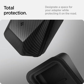 Spigen Cybercase beside adapter and hand to show compact scale and portability