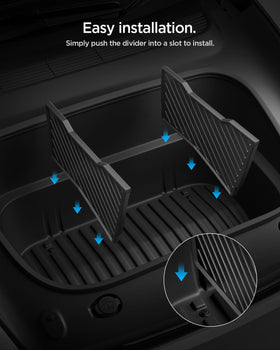 Spigen divider in lifestyle scene with parked Tesla demonstrating real-world use