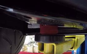 Sporthfish pad next to ruler showing 5-inch diameter for fit confirmation and sizing benefit