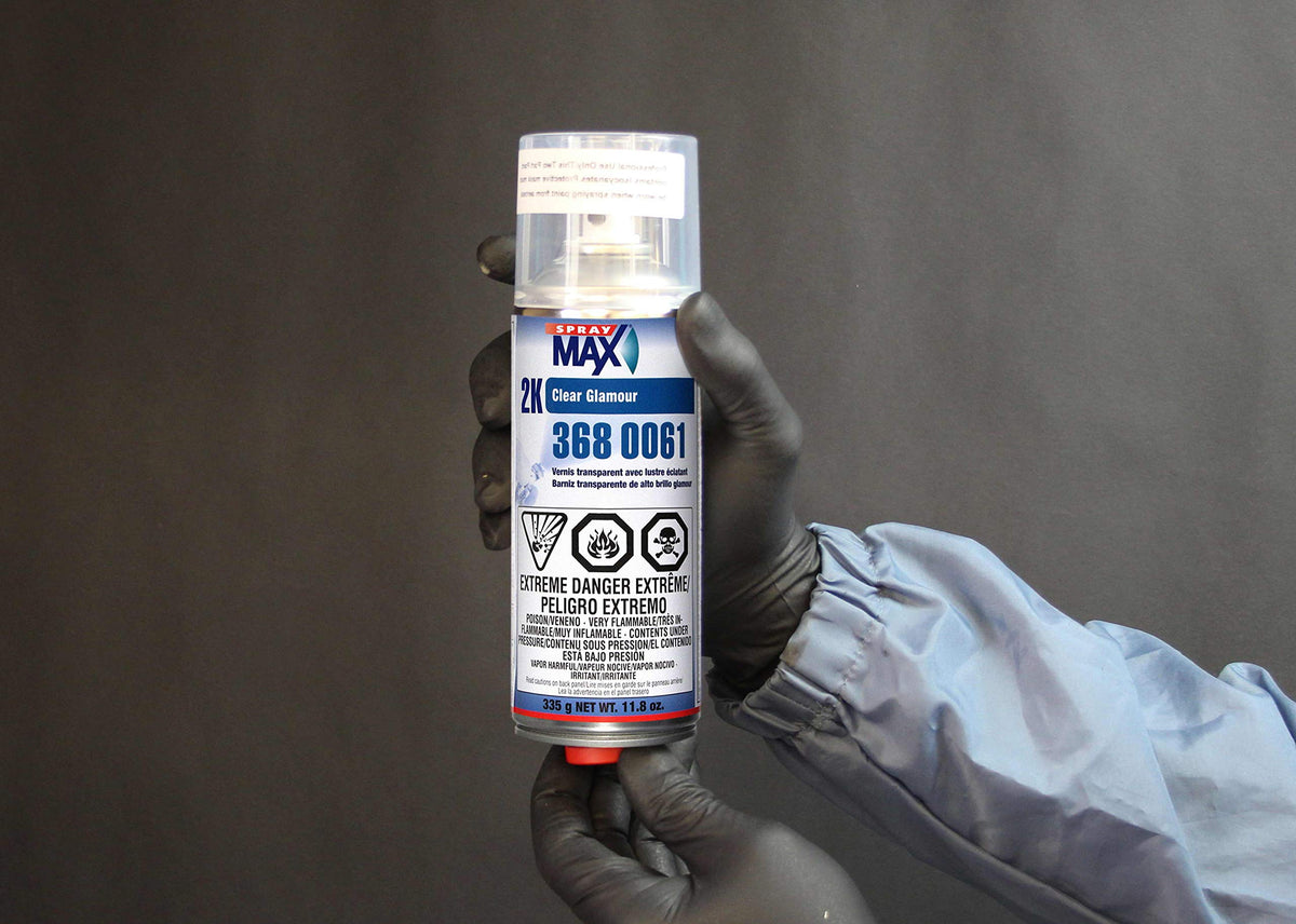 SprayMax 2K activated can in hand showing ready-to-use convenience