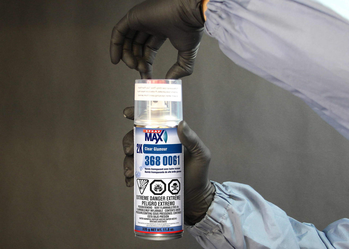 SprayMax 2K high gloss on car hood showing deep reflective finish