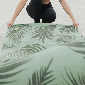 Sprints towel in beach setting showing versatile outdoor protection