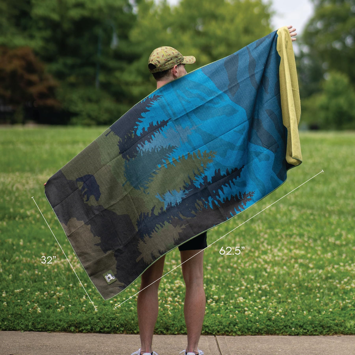 Sprints towel rolled next to water bottle to show compact burrito size