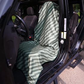 Sprints towel used in car showing seat protection and travel convenience