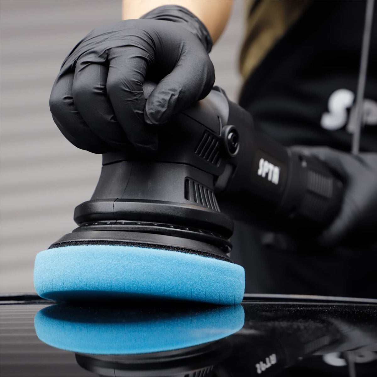SPTA blue T60 displayed in a detailing setup showing professional workshop use
