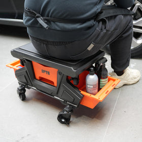 SPTA in garage lifestyle shot with mechanic using seat, speeds up car tasks