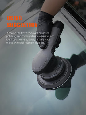 SPTA pad in use on a car window illustrating effective waterspot removal and improved visibility