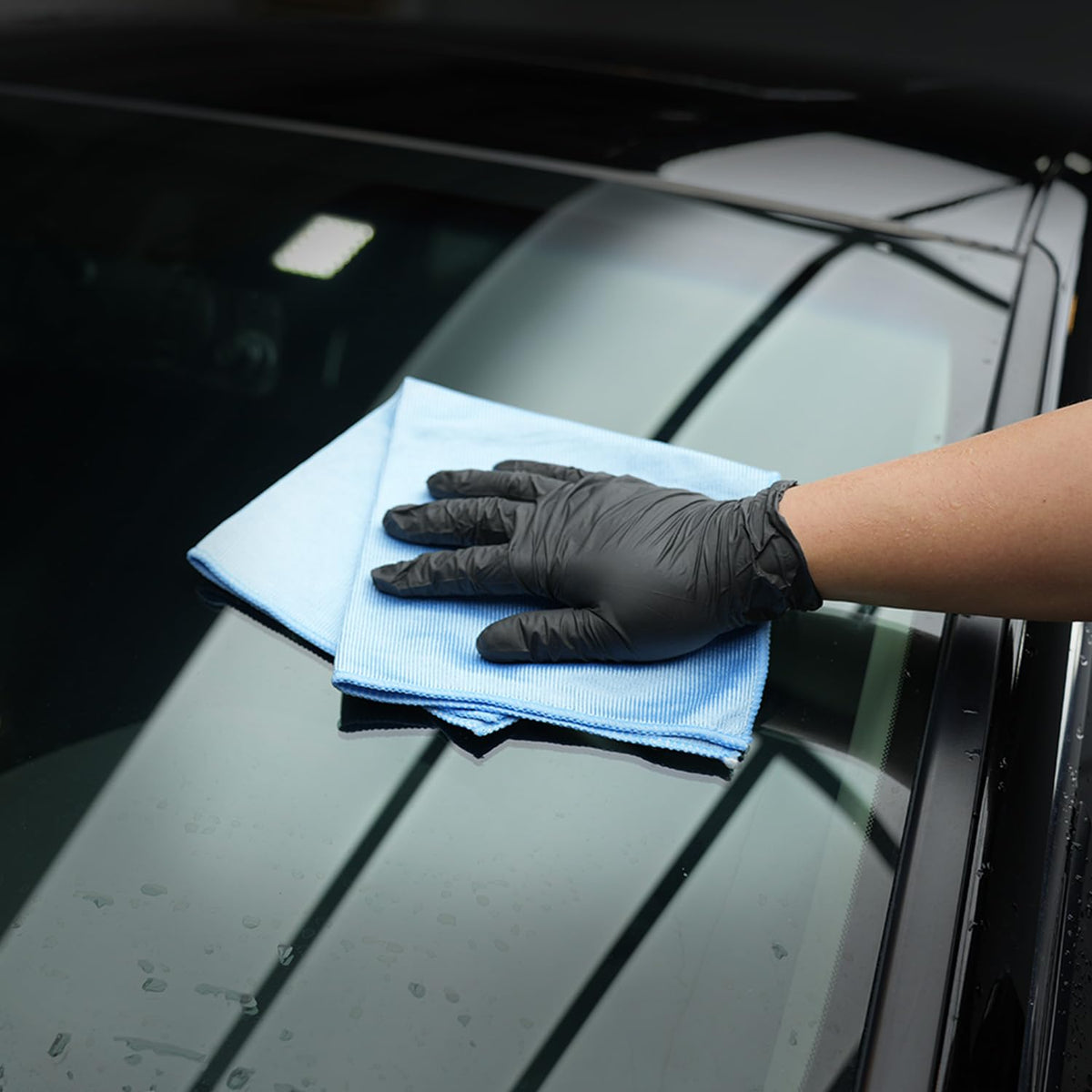 SPTA cloth used inside car delivering clean, clear interior surfaces