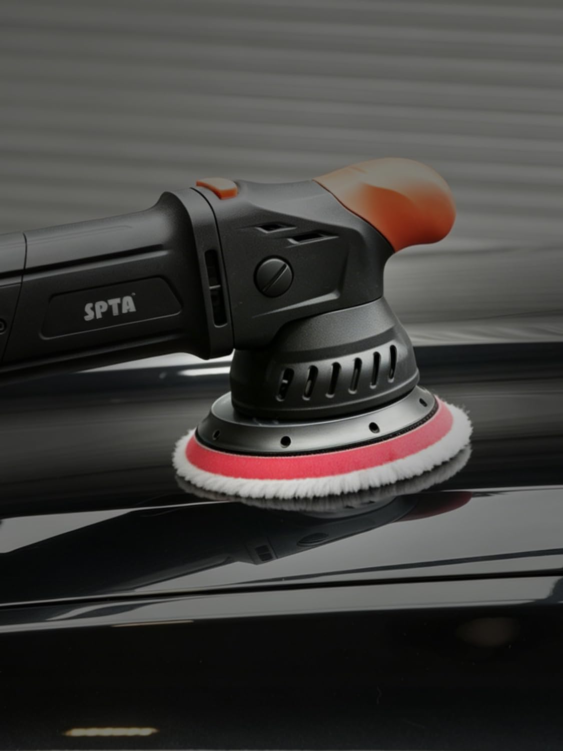 SPTA detailing scene with bucket and polisher showing professional use