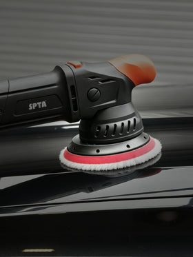 SPTA detailing scene with bucket and polisher showing professional use