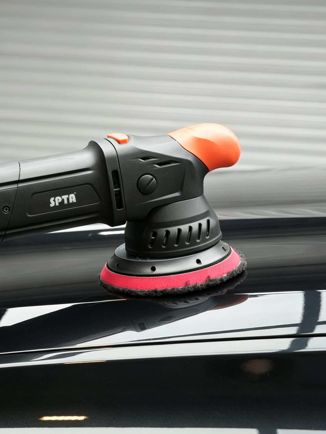 SPTA detailing setup with pads, polisher, and polish for professional workflow