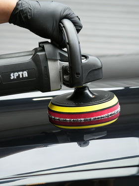 SPTA detailing station with pads ready for professional finishing work