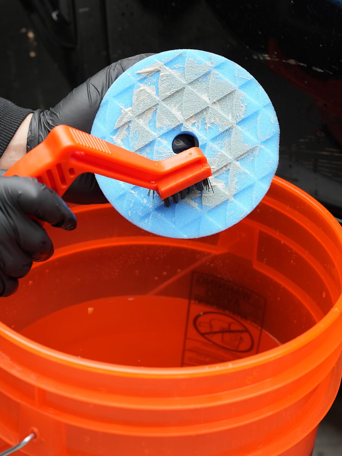 SPTA polish kit on garage workbench showing professional workflow benefit
