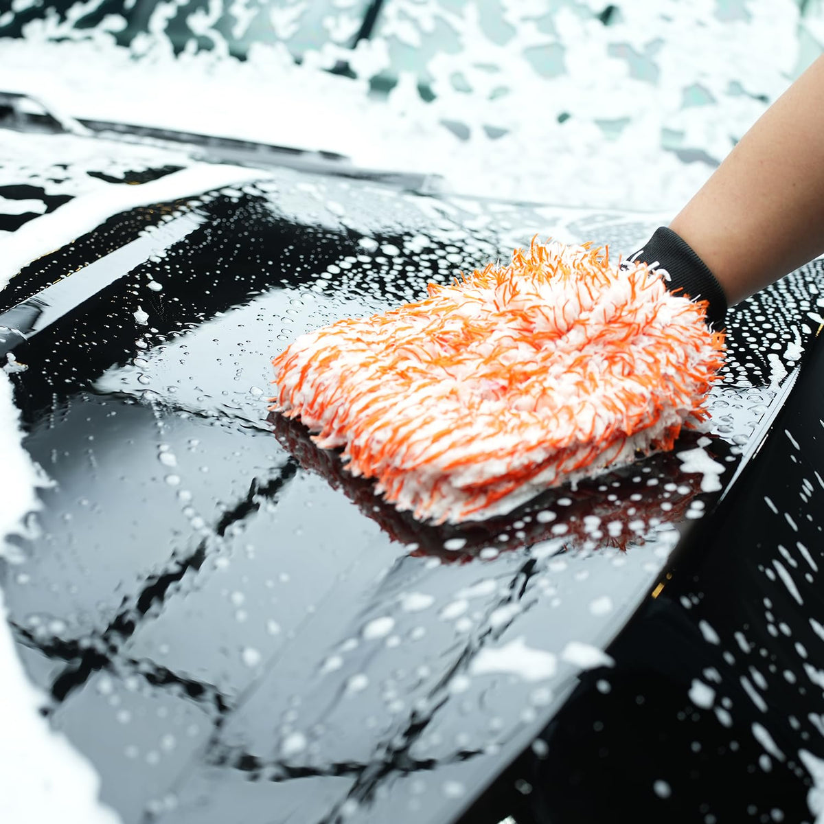 SPTA mitt in garage lifestyle scene enabling quick on-the-go cleaning