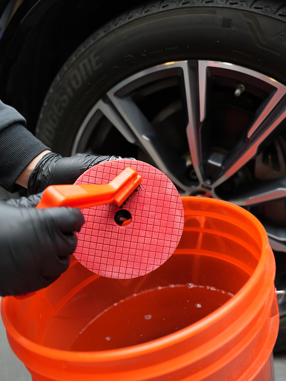 SPTA packaged kit staged in garage lifestyle for complete detailing workflow