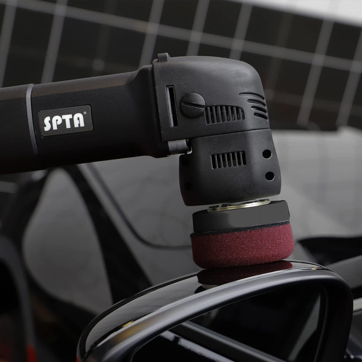 SPTA held in hand to show compact size and easy maneuverability
